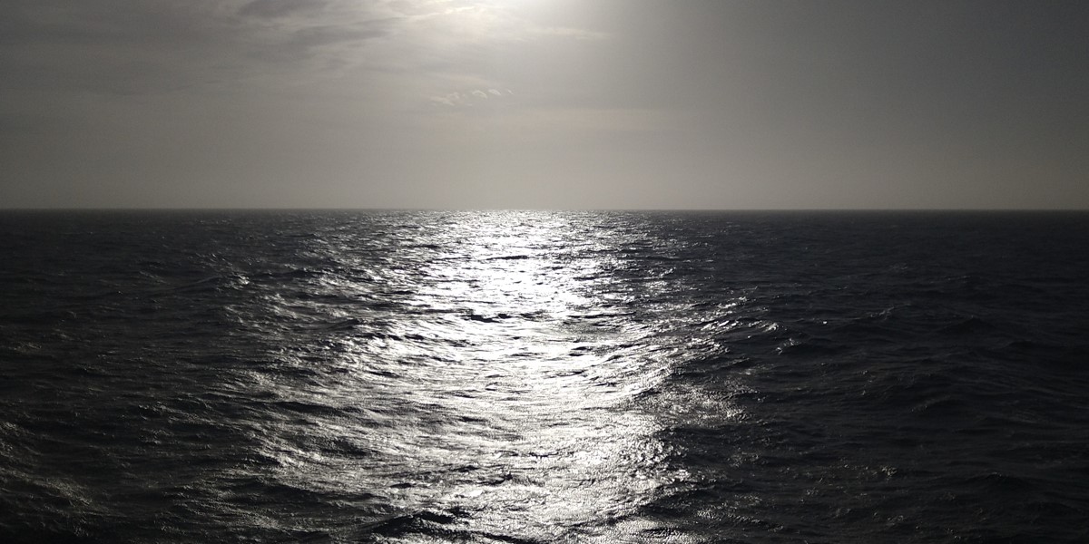 Dust is in the air, visible as a kind of haze on the horizon Dust is in the air, visible as a kind of haze on the horizon