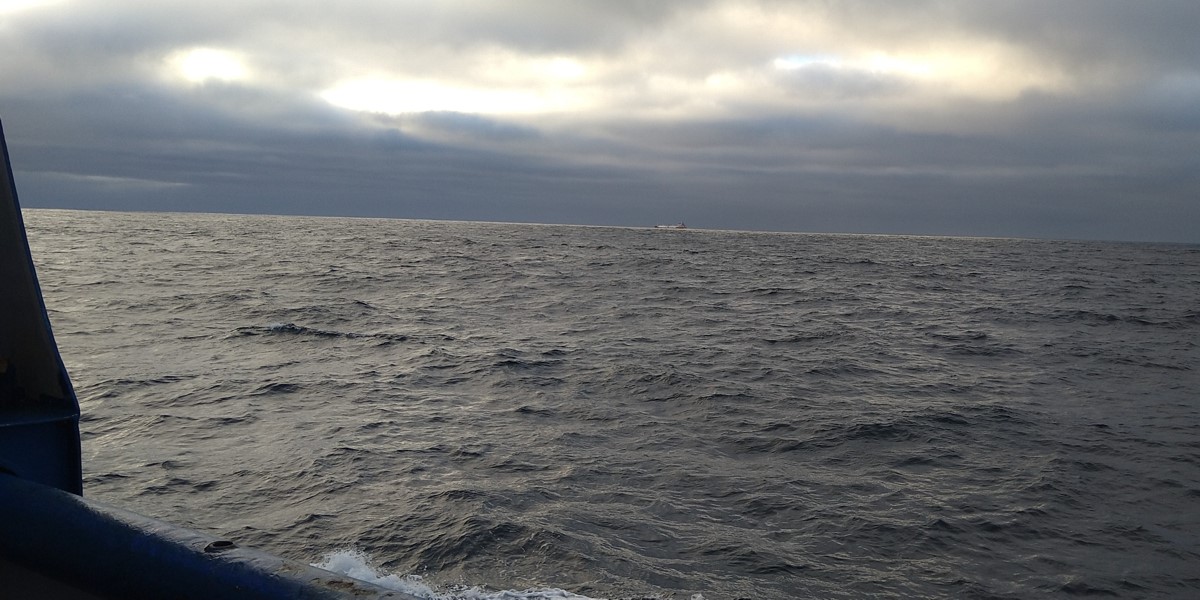 A passing ship in the spotlight A passing ship in the spotlight