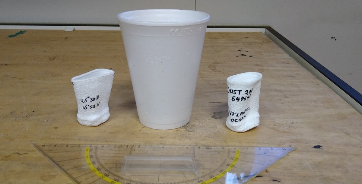 Two of the same Styrofoam cups of which all air was squeezed out at 300bar Two of the same Styrofoam cups of which all air was squeezed out at 300bar
