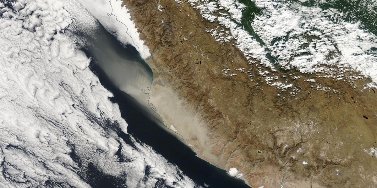 Satellite image showing dust blowing from the Peruvian Desert across Paracas into the eastern South Pacific Ocean. Image copyright: NASA Satellite image showing dust blowing from the Peruvian Desert across Paracas into the eastern South Pacific Ocean. Image copyright: NASA