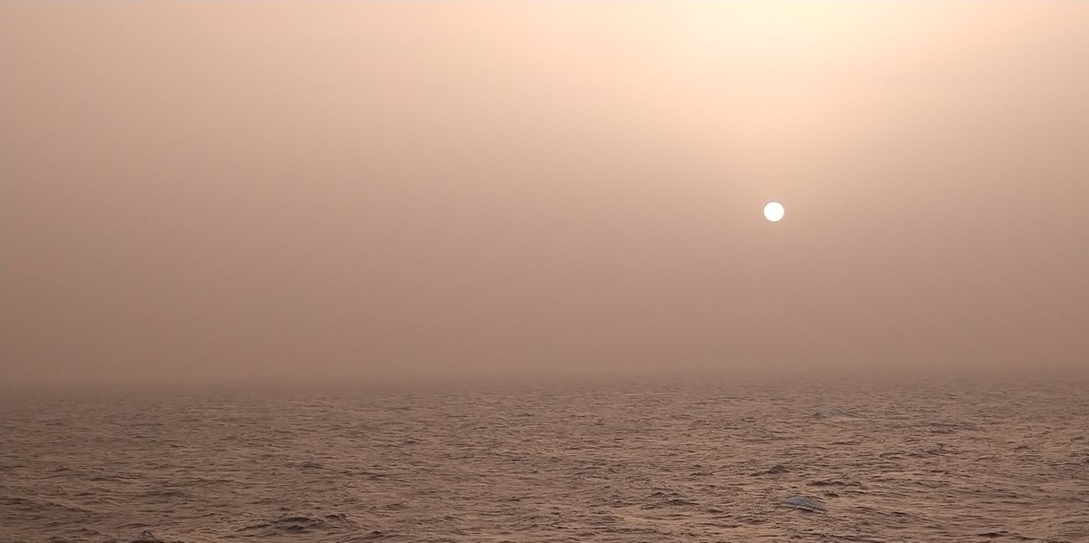 A dusty sunset over the equatorial North Atlantic Ocean A dusty sunset over the equatorial North Atlantic Ocean